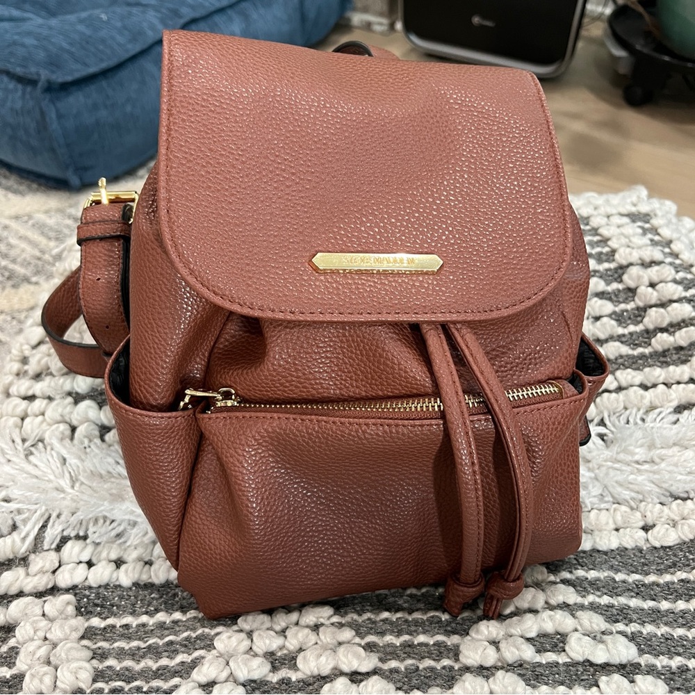 Steve Madden backpack purse with drawstring and gold detail